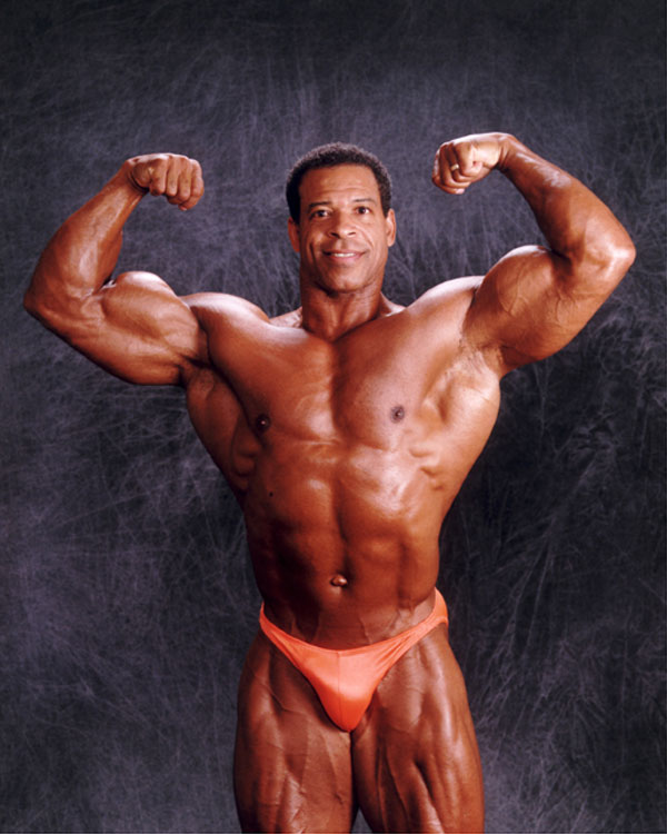 bodybuilder Bill grant posing
