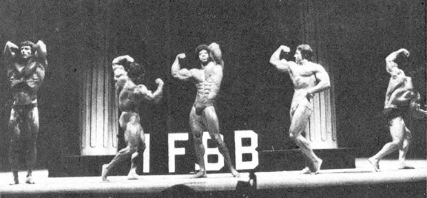 Bill grand in the IFBB pose off with Arnold Schwarzenegger