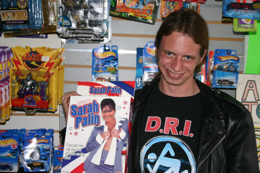 Jack Drago holds a Sarah Palin blow up doll at Collectors Realm 3