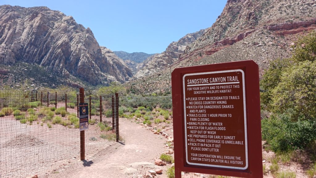 SANDSTONE CANYON TRAIL
FOR YOUR SAFETY AND TO PROTECT THIS SENSITIVE WILDLIFE HABITAT:
PLEASE STAY ON DESIGNATED TRAILS NO CROSS COUNTRY HIKING
WATCH FOR DANGEROUS SNAKES AND PLANTS
TRAILS CLOSE 1 HOUR PRIOR TO
PARK CLOSING
BRING PLENTY OF WATER
WATCH FOR FLASH FLOODS KEEP OUT OF WASH
BE PREPARED FOR EARLY SUNSET CELL PHONE COVERAGE IS UNRELIABLE
PACK IT IN PACK IT OUT PLEASE DONT LITTER
YOUR COOPERATION WILL ENSURE THE CANYON STAYS OPEN FOR ALL VISITORS