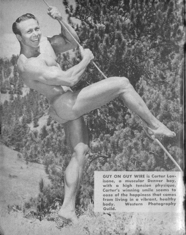 GUY ON GUY WIRE is Carter Lov- isone, a muscular Denver boy, with a high tension physique. Carter's winning smile seems to ooze of the happiness that comes from living in a vibrant, healthy body. Western Photography Guild.