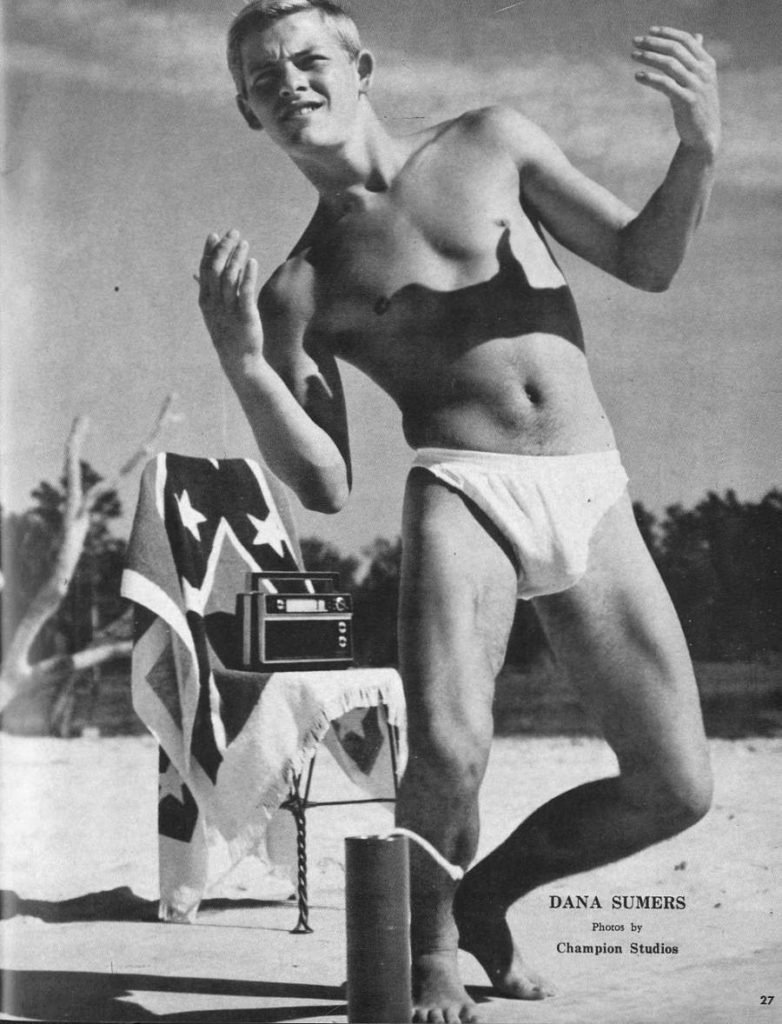 Dana Sumers poses in front of his confederate flag beach towel with a transistor radio in this photo taken by Champion Studios in 1968.