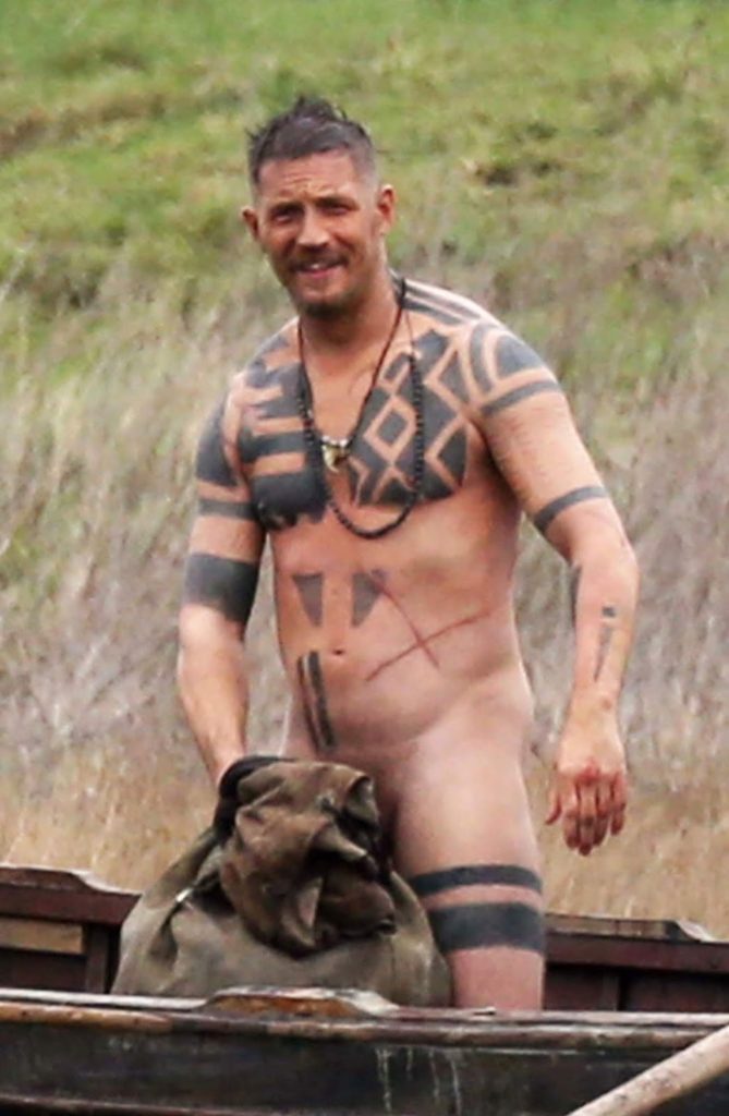 Tom hardy conceals his dick from the camera.