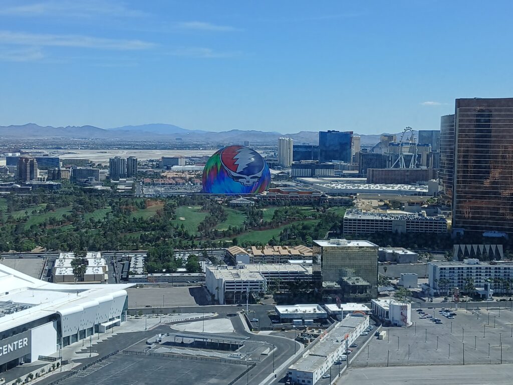 MSG Sphere displays a Grateful Dead logo across the Wynn golf course from the Fontainebleau.
