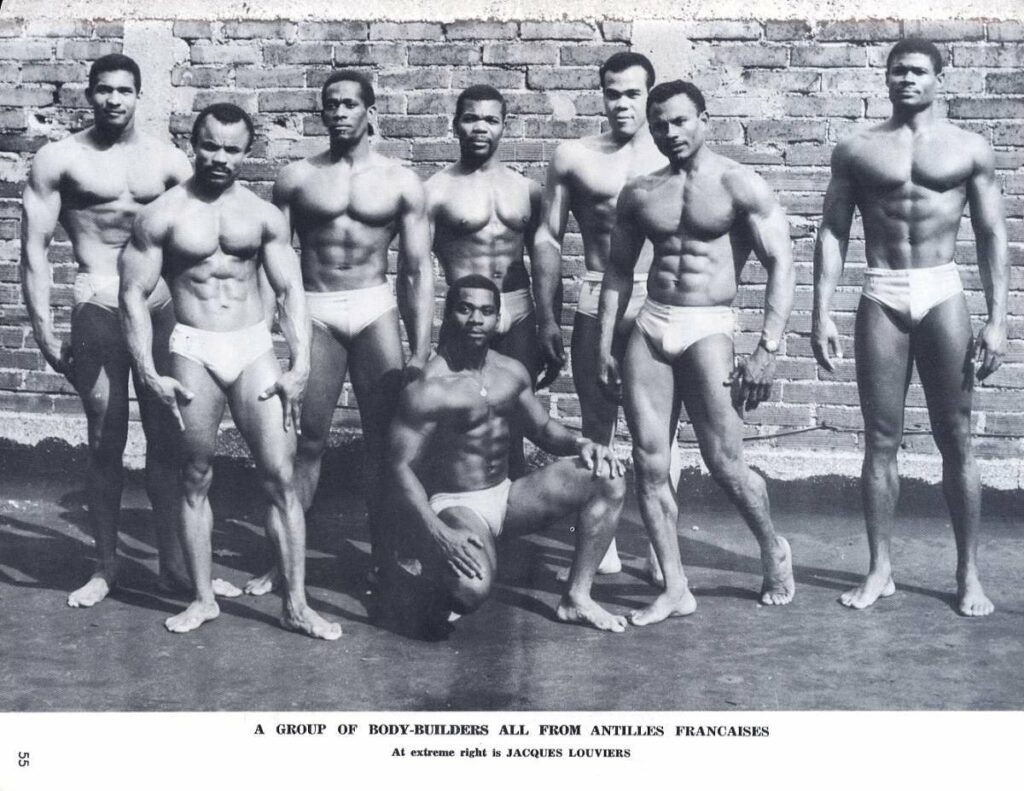 A GROUP OF BODY-BUILDERS ALL FROM ANTILLES FRANCAISES
At extreme right is JACQUES LOUVIERS